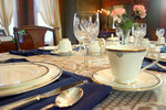 Breakfasst is served including: gourmet tea or coffee, fresh baked goods, fruit of the season and main asssorted dish