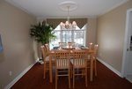 Dining area for 8 overlooks the pool