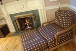 Relax by the warmth of the fireplace