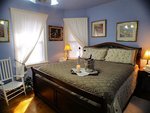 This is one of three well appointed bedrooms and includes a King Size bed.